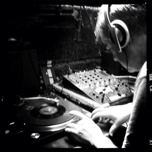 Deano von Lounge aka DJ Butcher tries to stop his vinyl melting in the 47 degree heat.